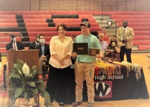 Clark was presented the Brandon T. Lawrence Scholarship by OFTC high school coordinator Robbie Hobbs.