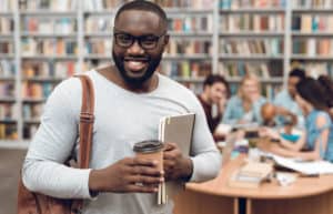 smiling man in library