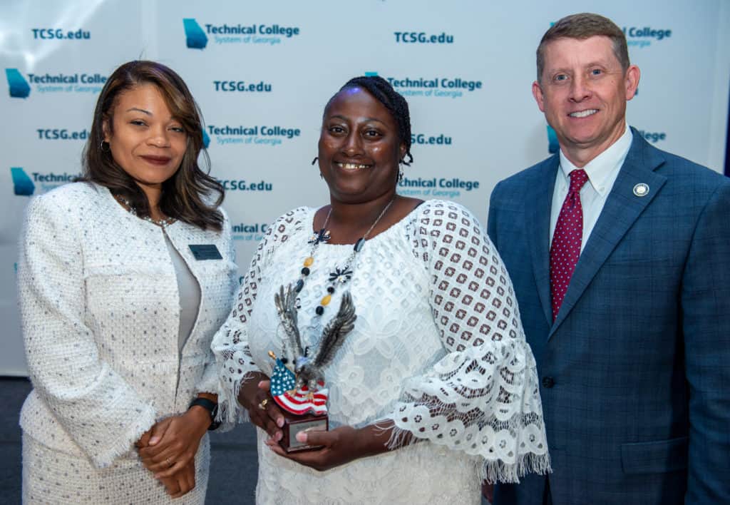 L-R: Dr. Cayanna Good, TCSG Assistant Commissioner of Adult Education at; Rochelle White, OFTC Adult Education student and the state's 2022 Dinah Culbreath Wayne Eagle award winner; Greg Dozier, TCSG Commissioner.
