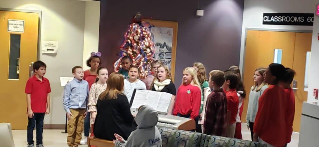 The Southwest Laurens Elementary School Choir performing during OFTC's Festival of Trees Sip 'N See. 