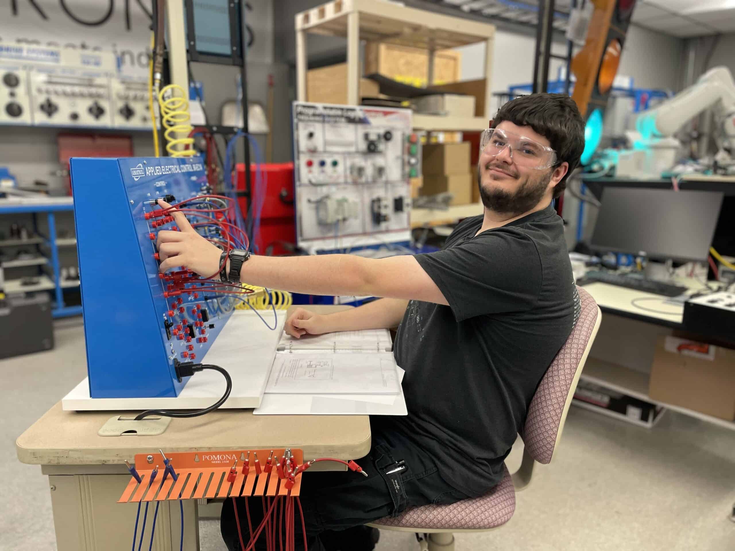 OFTC Mechatronics student James Scarborough in the lab